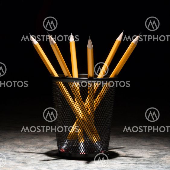 Pencils in holder.