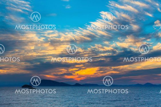 Stunning sunset in the sea among the Islands.