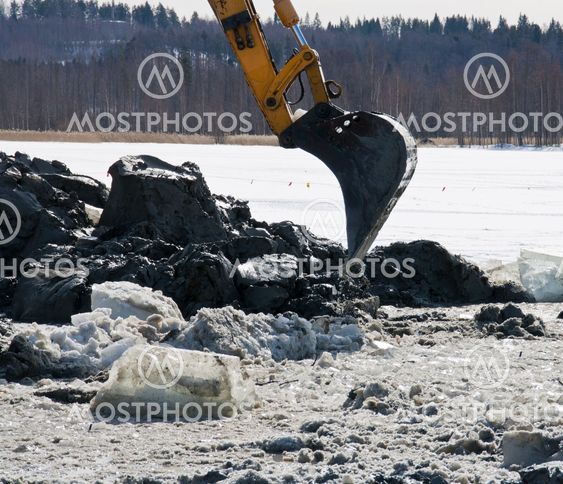 Excavator arm digging