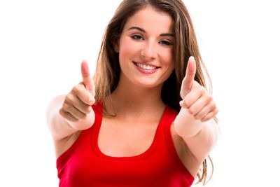 Young woman with thumbs up