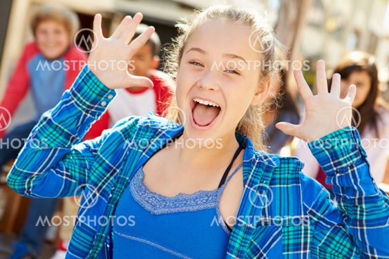 Group Of Children Hanging Out Together In Mall