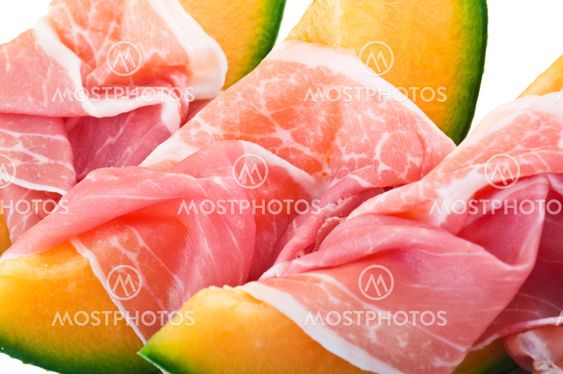 Ham and melon on white background