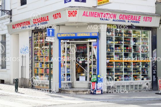 Brussels, Belgium - April 2015: Local grocery selling food, tobacco, and alcoholic drinks in Brussels, Belgium