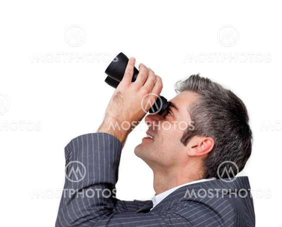 Businessman looking up through a pair of binoculars