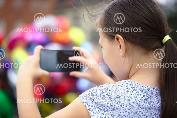 Girl is using smartphone