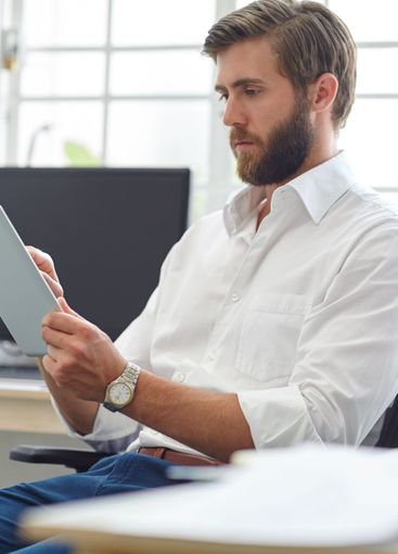 Man, typing and employee with tablet in office, event...