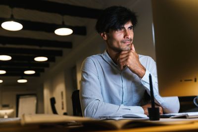 Portrait of a confident concentrated businessman working