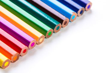 Colorful assortment of pencils arranged in a vibrant...