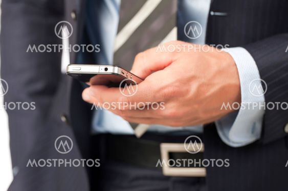 a hand holding smart phone