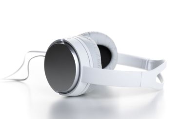 White headphones on white background close up