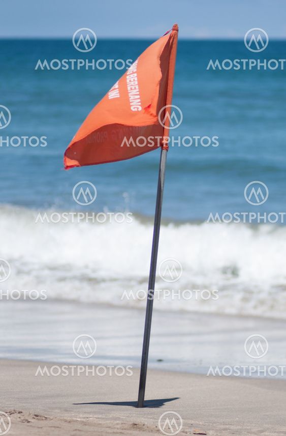 red beach flag