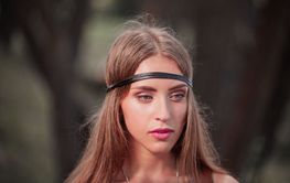 close up. portrait of attractive young hippie woman .