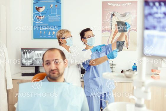 Sick man patient waiting for teeth examination sitting...