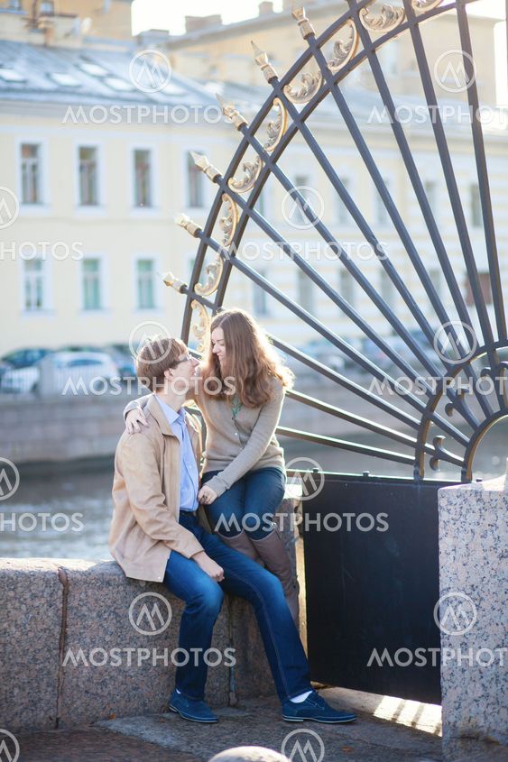 Dating romantic couple near the Summer garden in Saint-Petersburg, Russia