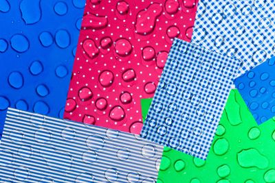 Abstract collage of color images with water drops