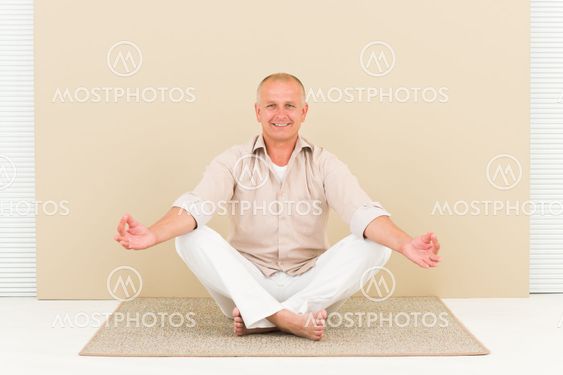 Casual business yoga smiling senior man meditate