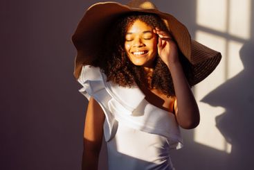 Close-up portrait of a young attractive smiling African...
