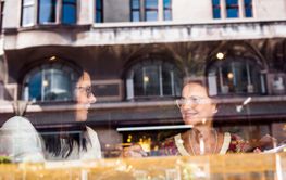 Two senior women sitting in restaurant