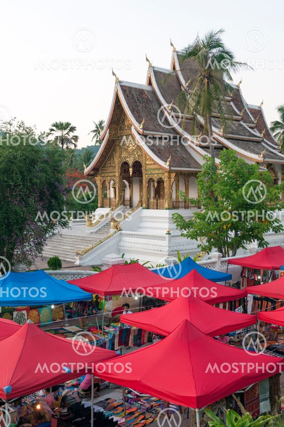 Luang Prabang, Laos - May 2012: Luang Prabang Night Market, popular tourist venue for souvenirs and handicraft products located on main street in central area in front of the Royal Palace Museum in the UNESCO World Heritage town of Lao PDR.
