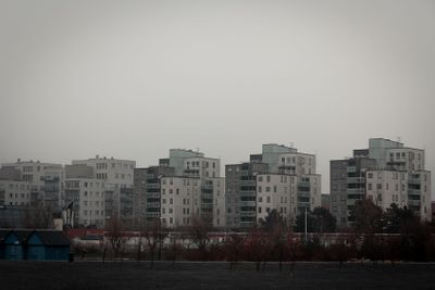 Some modern apartment buildings on an overcast winter...
