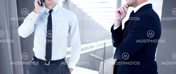 Composite image of elegant businessman in suit posing