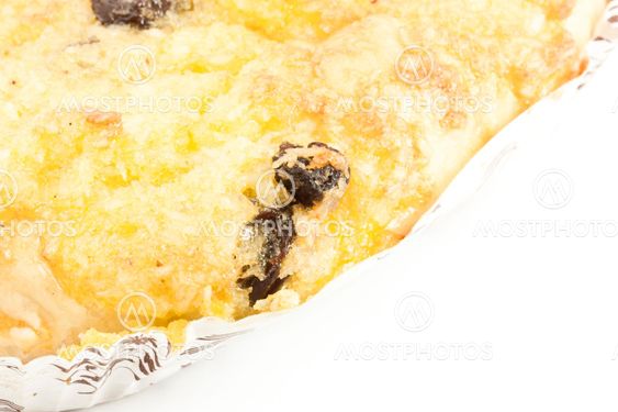 Close-up cake cup with Raisin on the white background