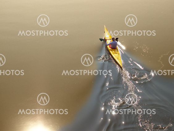 Lonely person in a boat