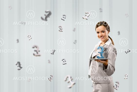 business woman holding a tablet with british pound