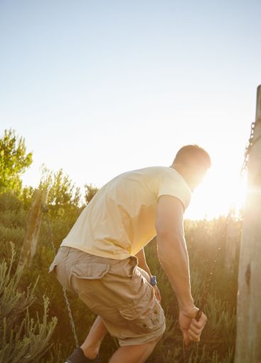 Fitness, person and walking on obstacle outdoor with...