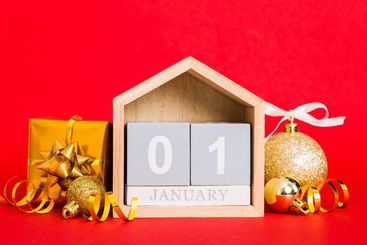 1 january. Christmas composition on colored background...