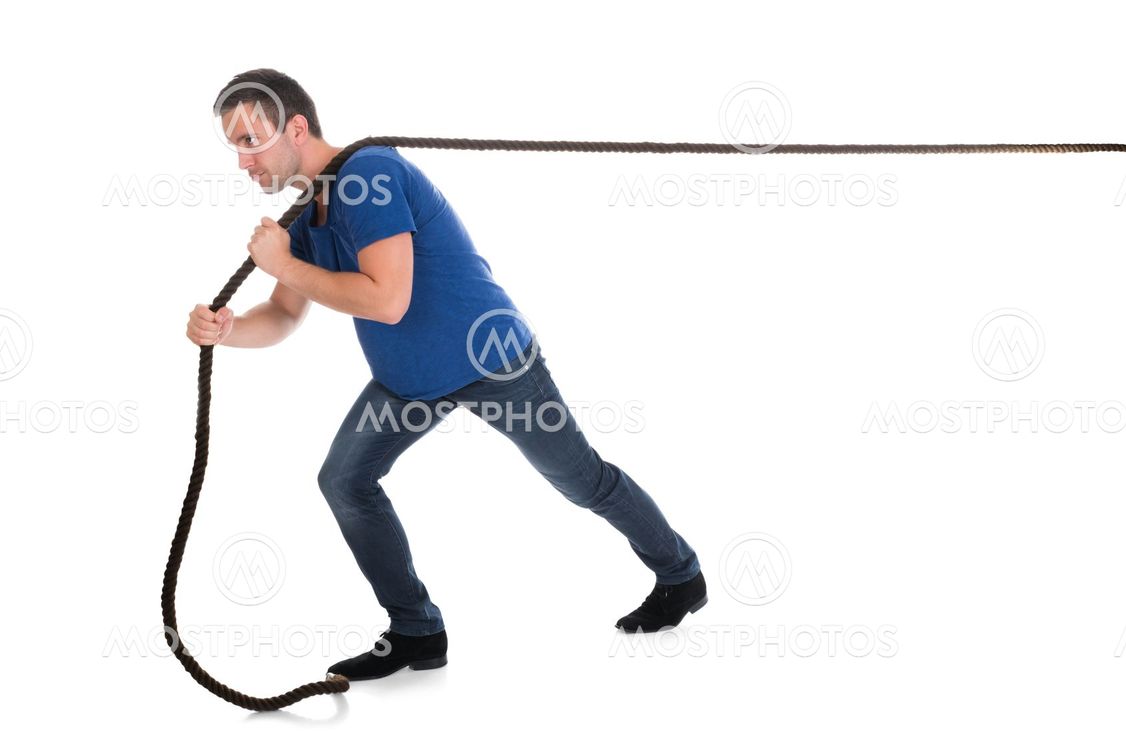 "Portrait Of A Man Pulling R..." av Andrey Popov Mostphotos