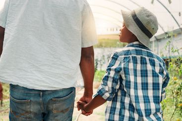 Family, child and holding hands with parent, greenhouse...