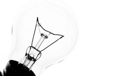Lightbulb on white background, close up shot