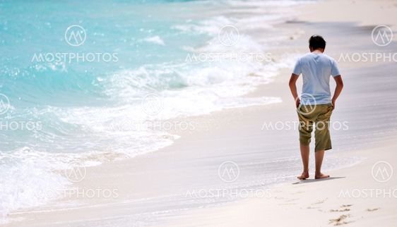 Man walking beach