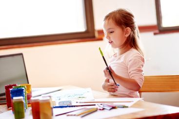 Creative, activity and child painting in home for...