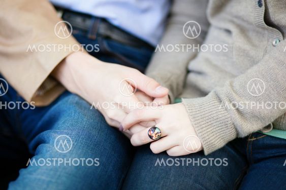 Loving couple holding hands during a date