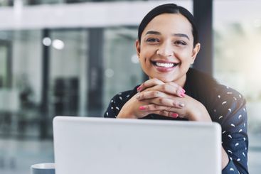 Happy, pride and portrait of businesswoman in office...
