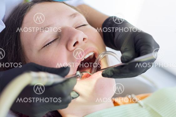 Close up dental treatment procedure in dental office