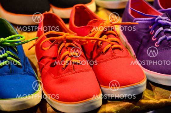Orange sneakers.