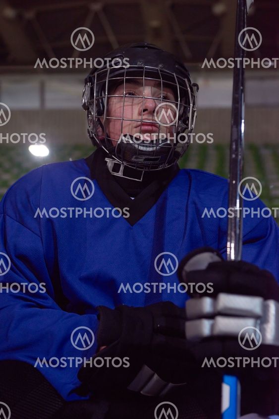 ice hockey players on bench