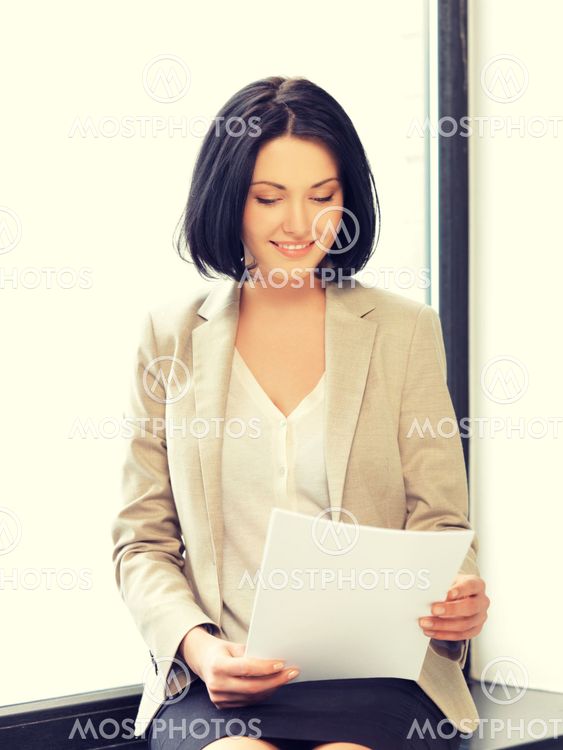 happy woman with documents