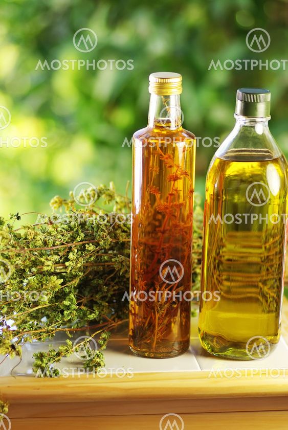 Olive oil,vinegar, and oregano herb.