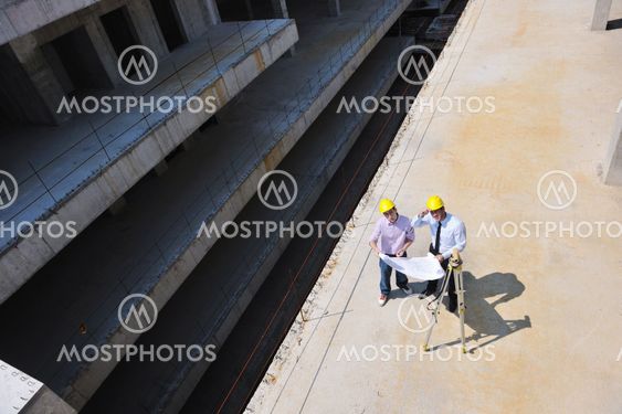 Team of architects on construciton site
