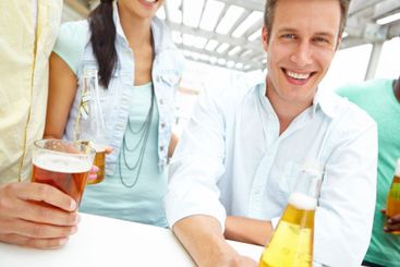 Beer, portrait or happy man in party for celebration,...