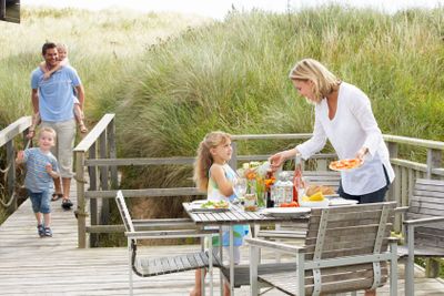 Family on vacation eating outdoors