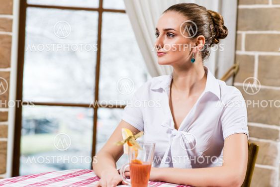 portrait of a nice lady in a restaurant