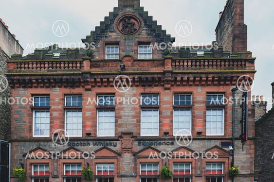 Edinburgh, Scotland - April 2018: Front facade of The Scotch Whiskey Experience on Royal Mile, touristic street of Old Town Edinburgh City in Scotland, UK