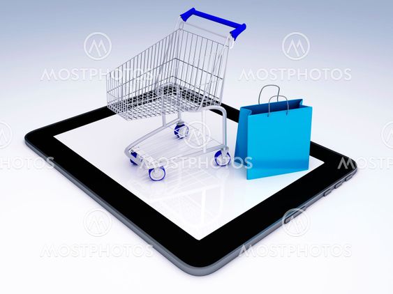 Shopping Cart over Tablet PC. E-commerce Concept.