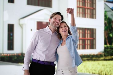Excited Couple Buying Their First Home Together
