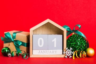 1 january. Christmas composition on colored background...